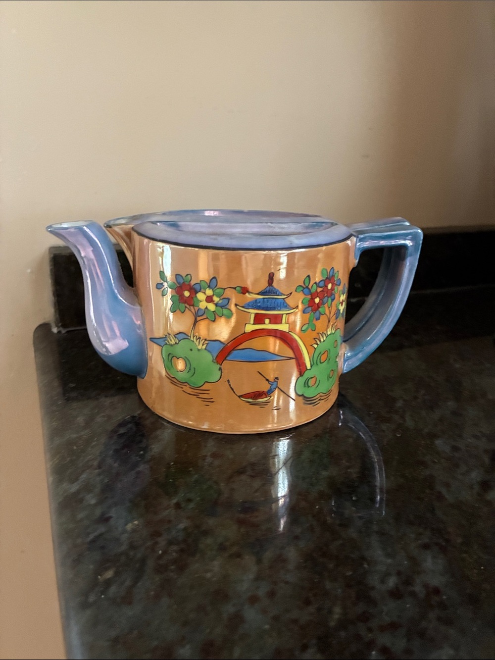 Hand-Painted Ceramic Teapot with Blue Handles and Gold Finish